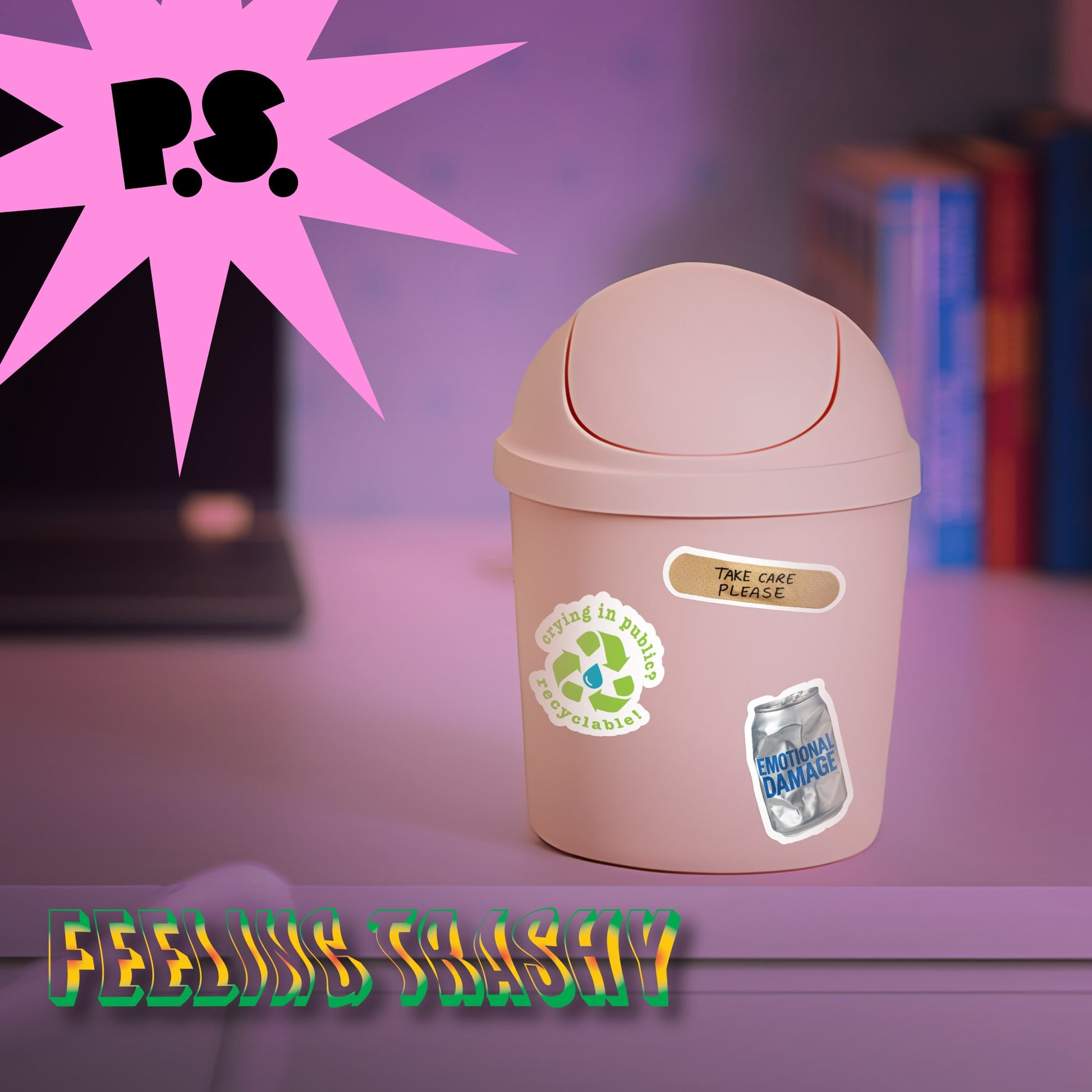 Pink trash bin with recycling labels on a blurred background